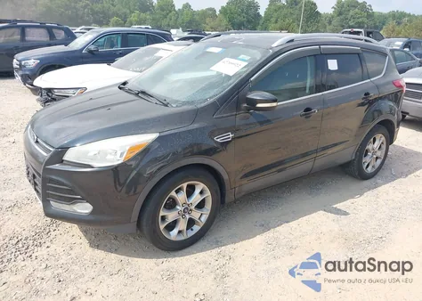 2014 Ford Escape Titanium z USA, uszkodzony, nr VIN 1FMCU0J93EUD80669